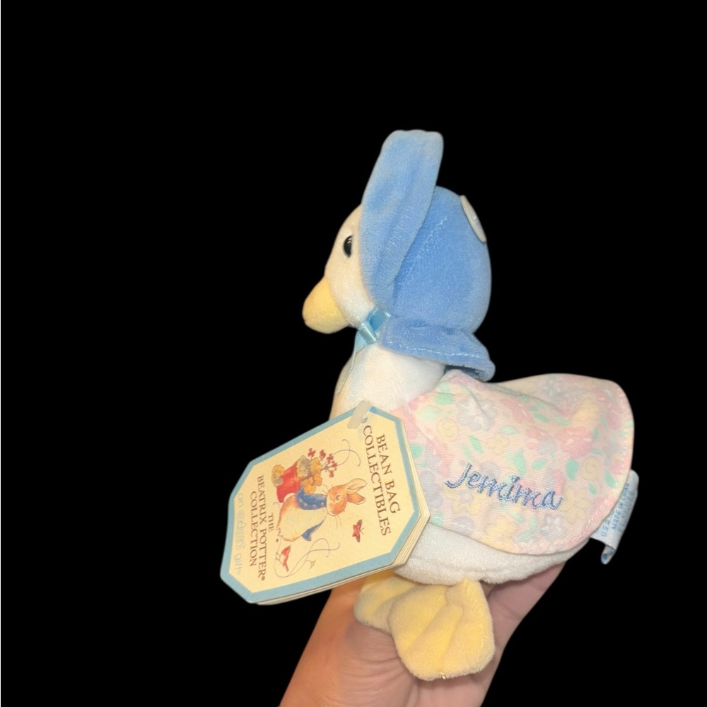 Adorable Duck Plush with Blue Bonnet